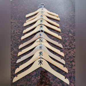 Pack of ten 11 inched Cosabella child wood hangers like new